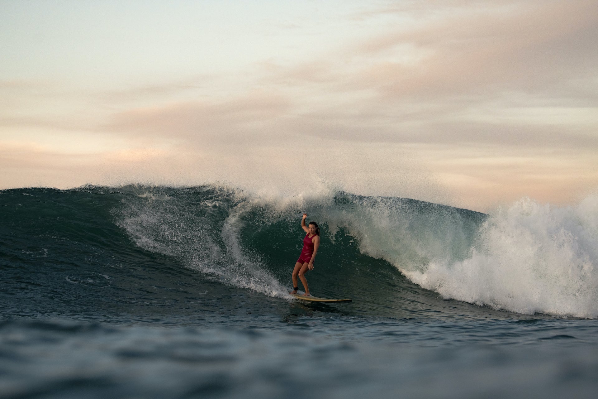 Elise Trigger surfing