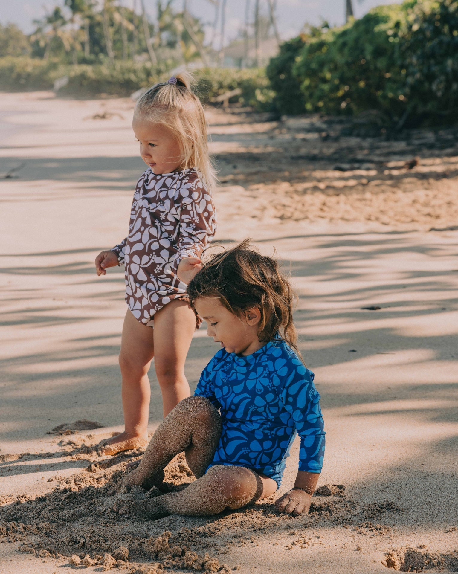 Introducing the Mini Ama Surf suit, a long sleeve one-piece swimwear, made to protect your little ones from the sun during long days at the beach