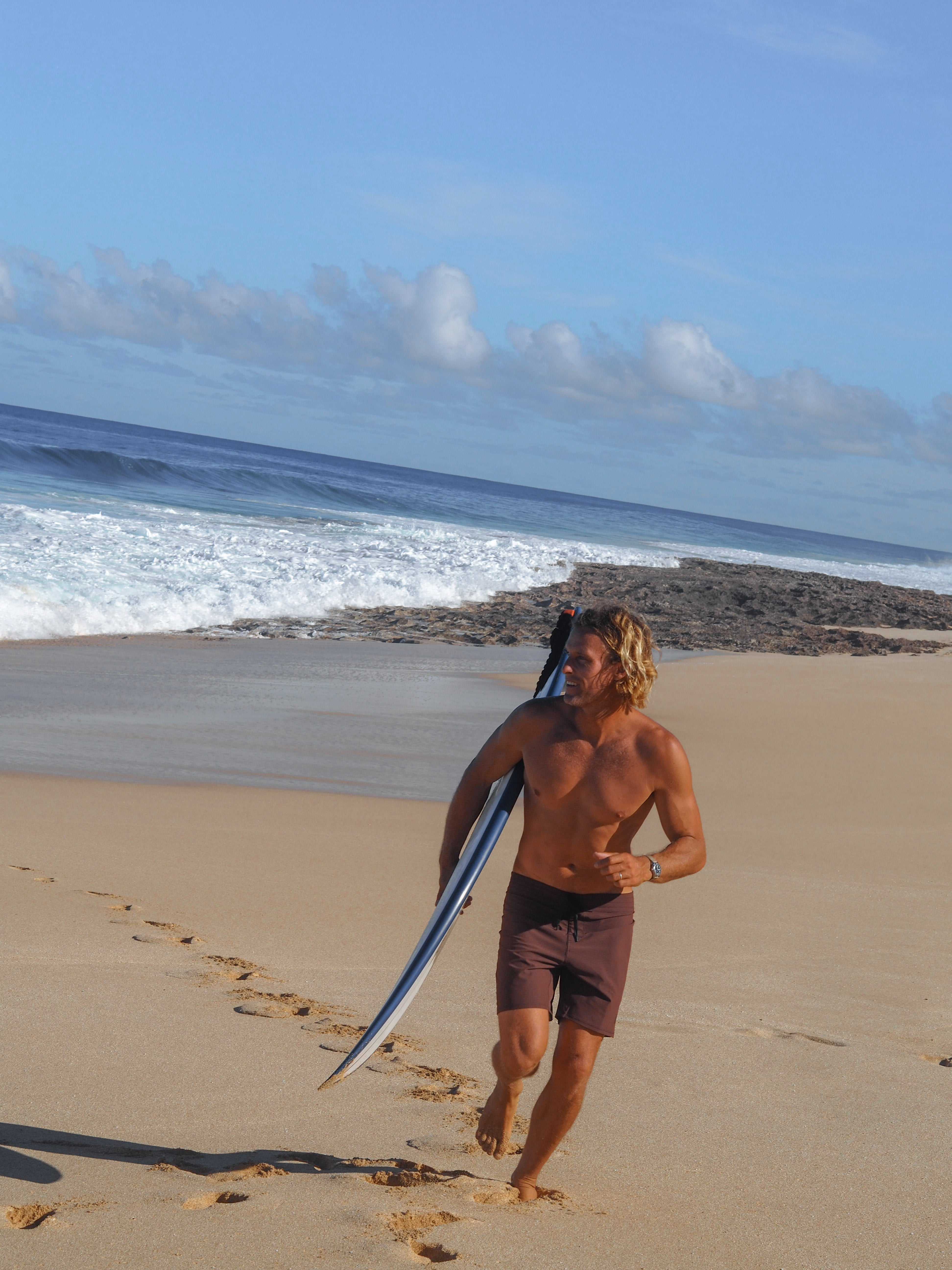 Men’s performance boardshorts designed for surfing, movement, and durability