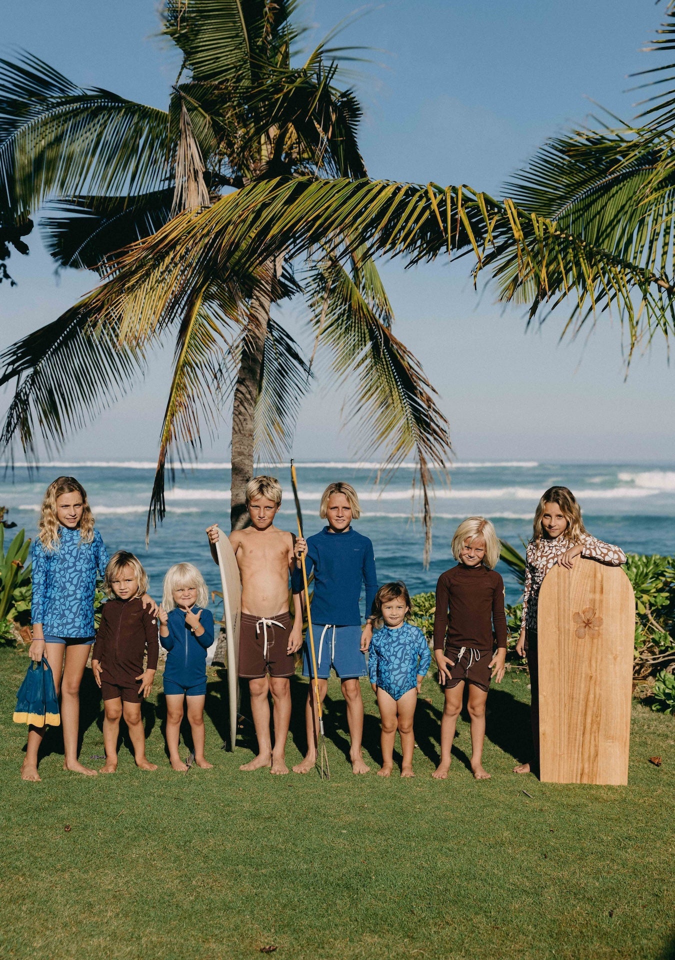 kid in a sustainable wetsuit