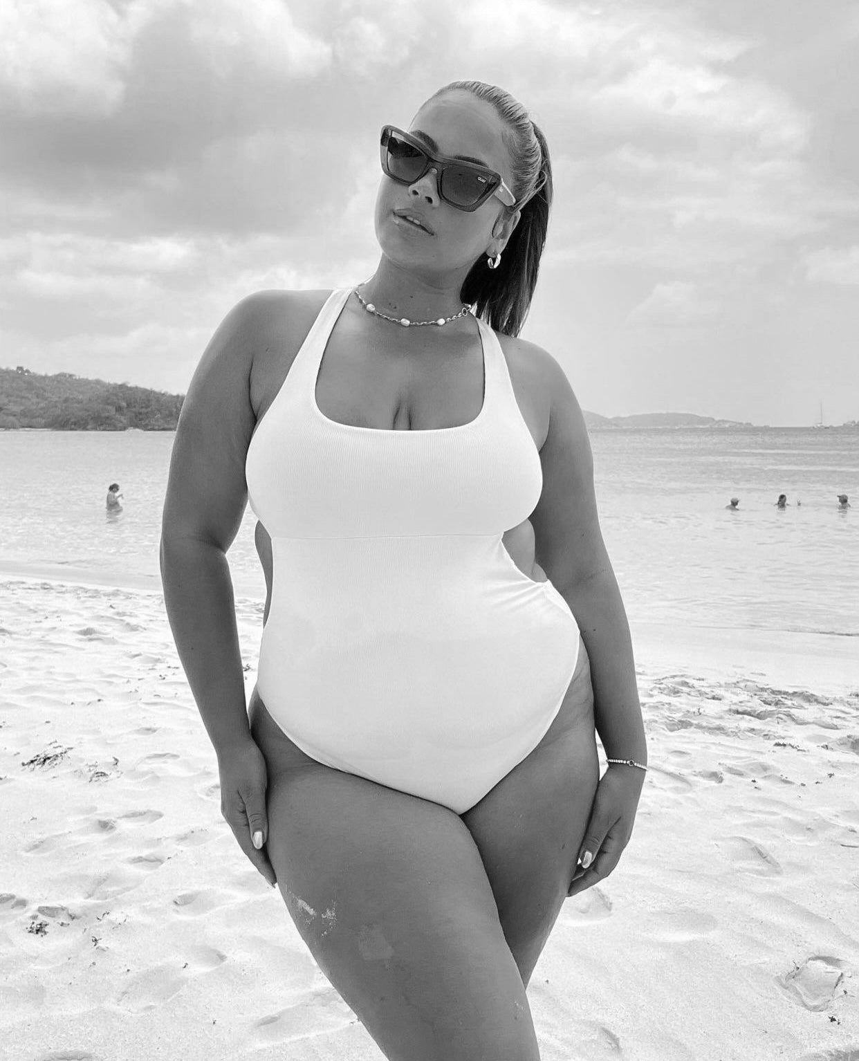 Margo is our new sporty one piece designed to be in mouvement with a racer back and a full bottom, we added some cuts-out for the fun & style. Fits like a glove!  Made from recycled fabrics, double lined for no see through. TRY it now!